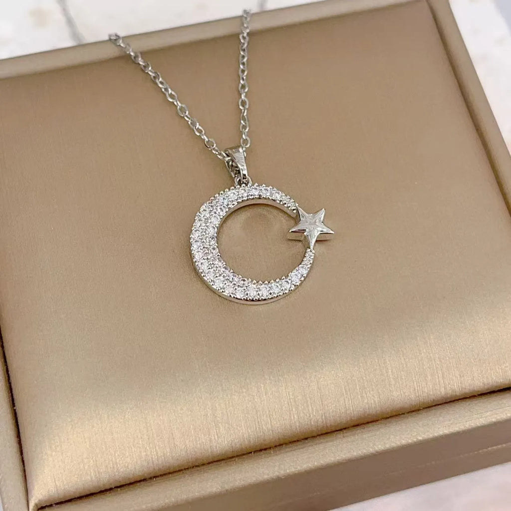 Gold electroplated geometric moon zircon pendant on titanium steel O-ring chain necklace