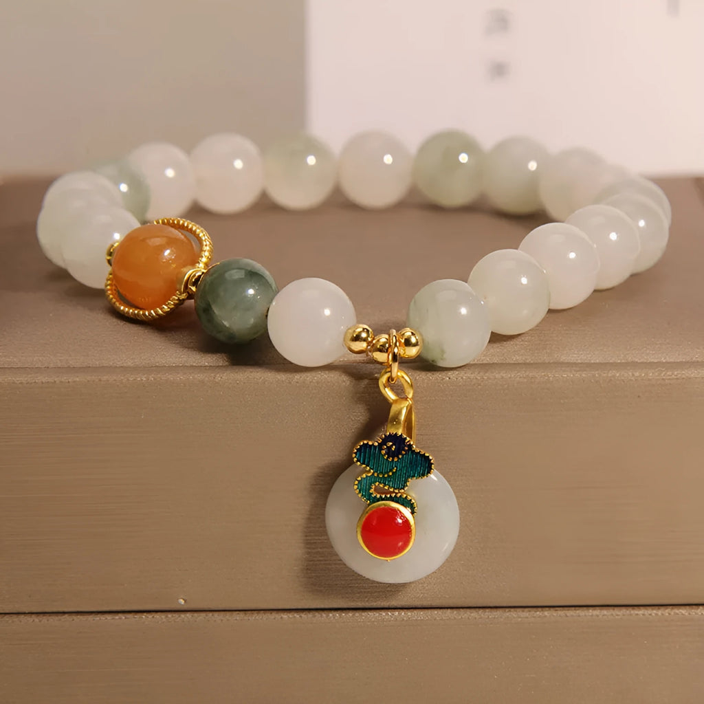 Women's ice jade crystal bracelet with pearl elements and xiangyun peace jade buckle