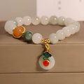 Women's ice jade crystal bracelet with pearl elements and xiangyun peace jade buckle
