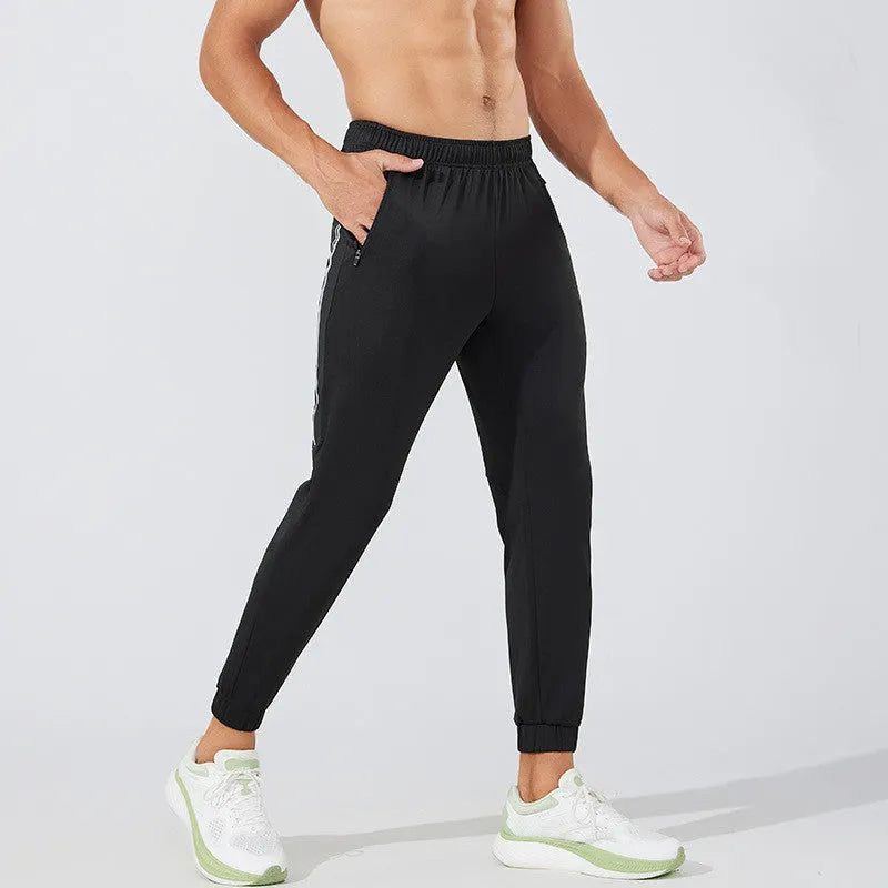 Men's black and navy blue running trousers with mid waist design and full-length cut