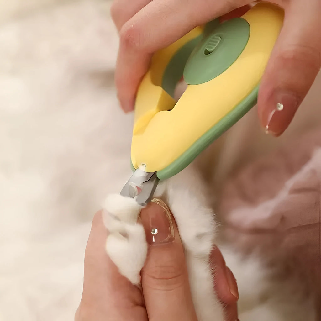 Green professional pet nail clipper with LED light and safety guard for small dogs and cats.