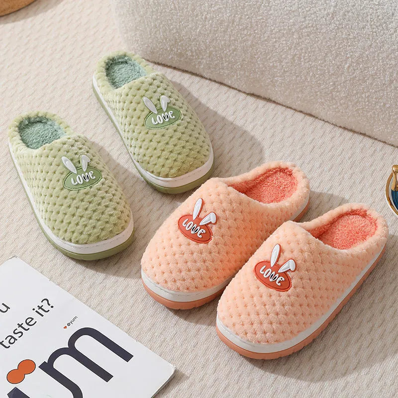Women's rabbit plaid design artificial fur house slippers with thick rubber soles in apricot colour.