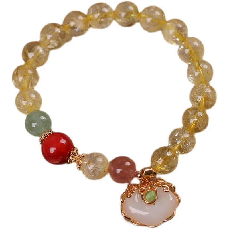 Women's bracelet with a natural yellow citrine jade ruyi pendant on an alloy chain