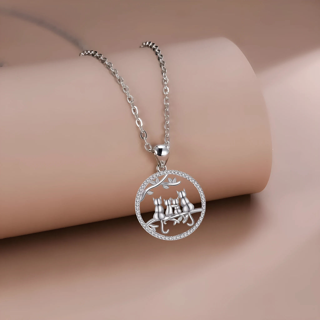 Four kitten pendant necklace on copper cross chain with electroplated finish