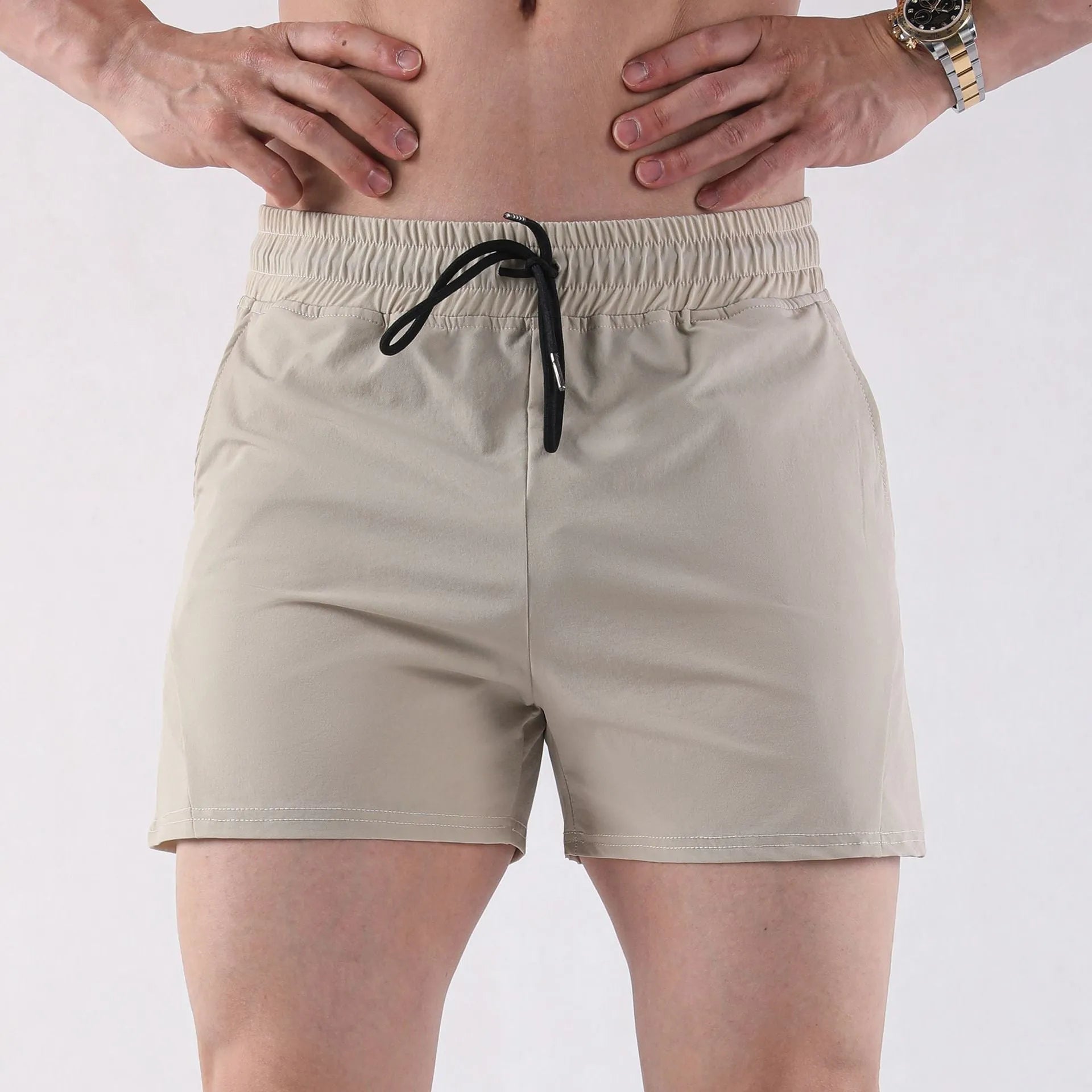 Men's thin polyester basketball shorts in grey colour with medium elastic waistband