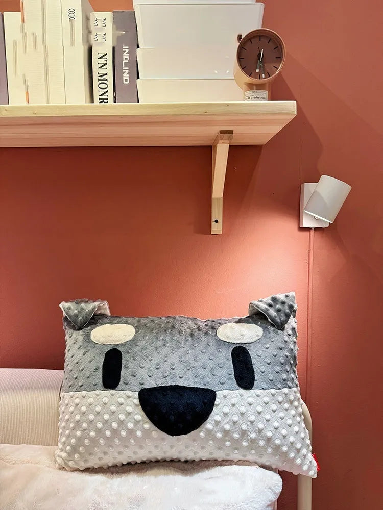 Grey and white West Highland puppy design dog pillow on a sofa, showing soft fabric and 50cm size.