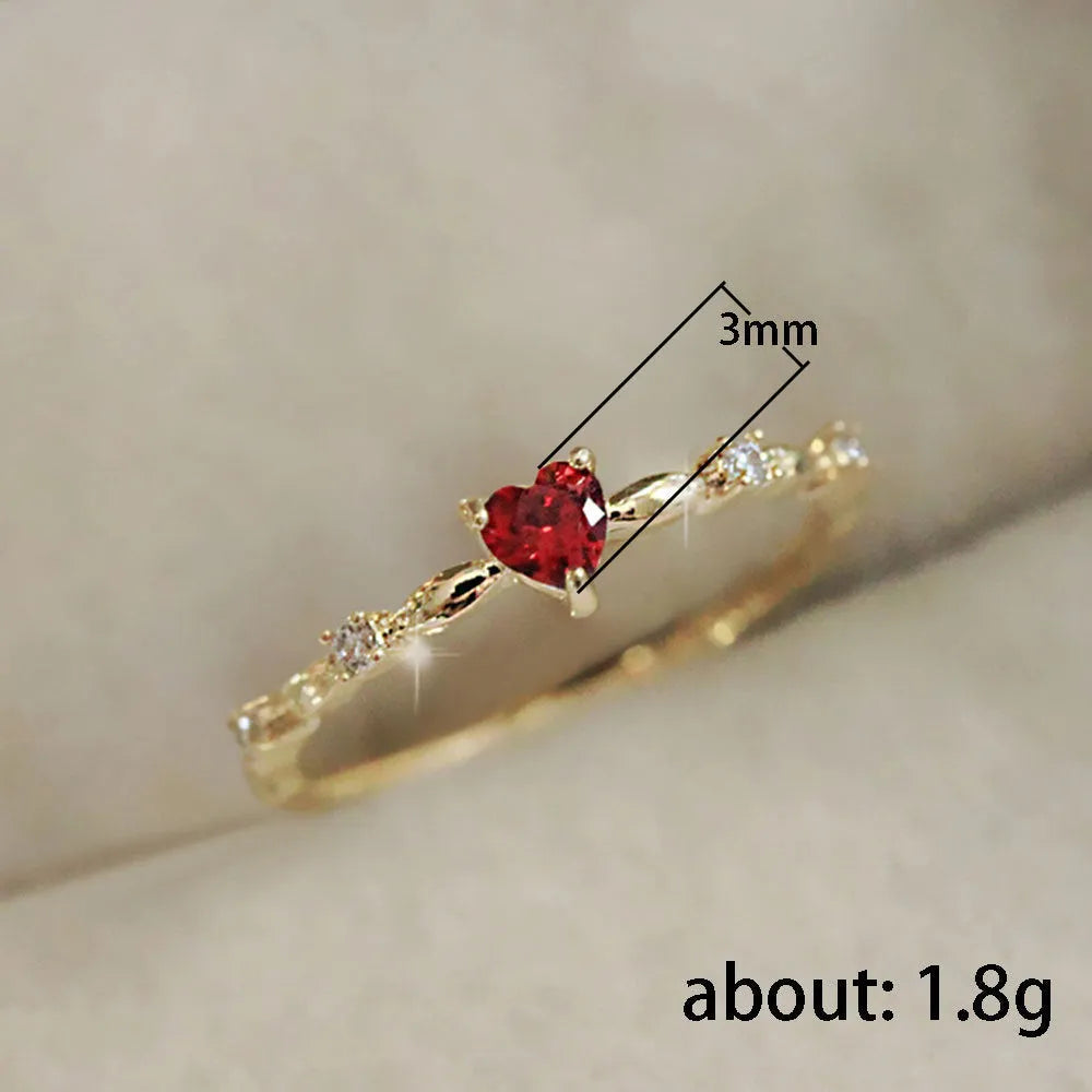 Zircon peach heart ring in gold or silver electroplated finish, sizes 6-10