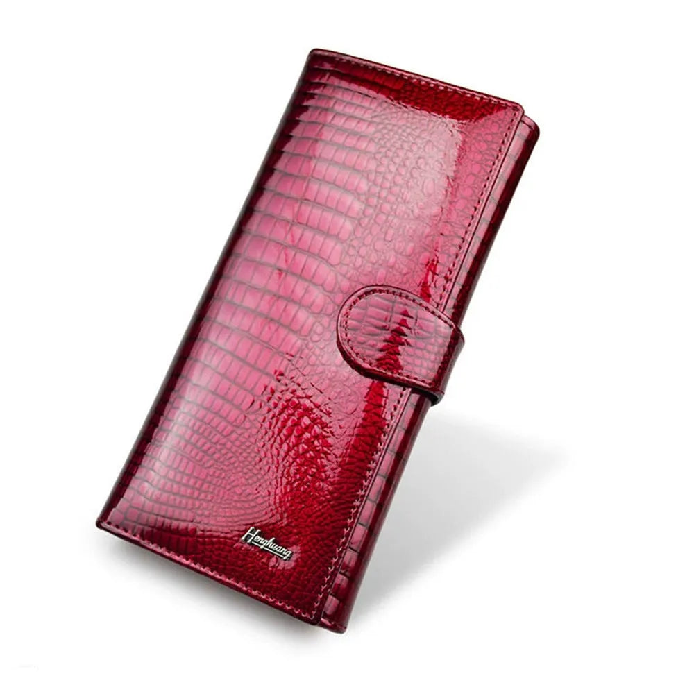 Genuine leather women's coin purse with crocodile pattern patent finish in wine red colour
