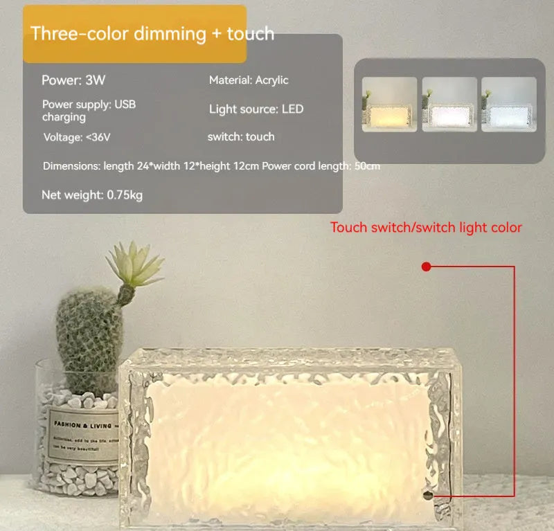 Geometric acrylic ice cube night lamp with colour changing LED lights on dark surface