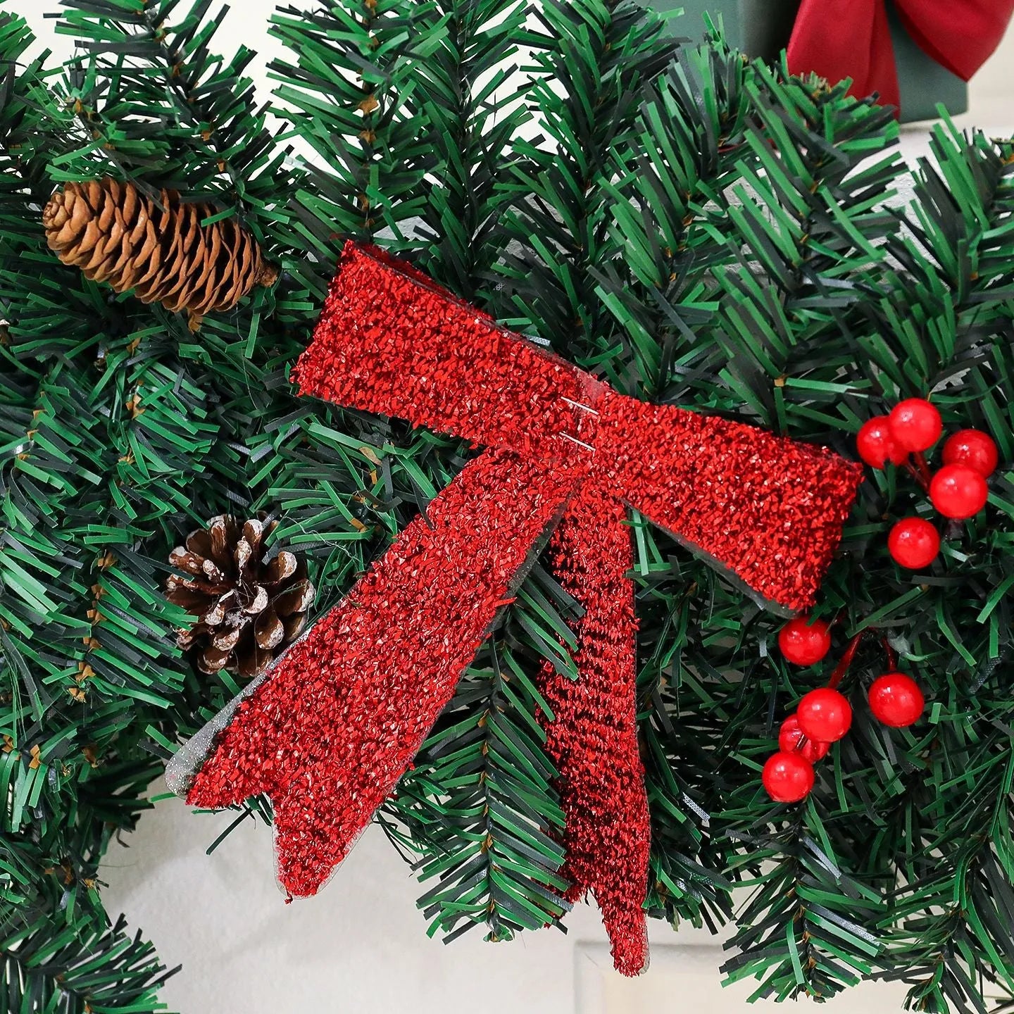 Christmas rattan decoration with pine cones and festive bow in European-style design