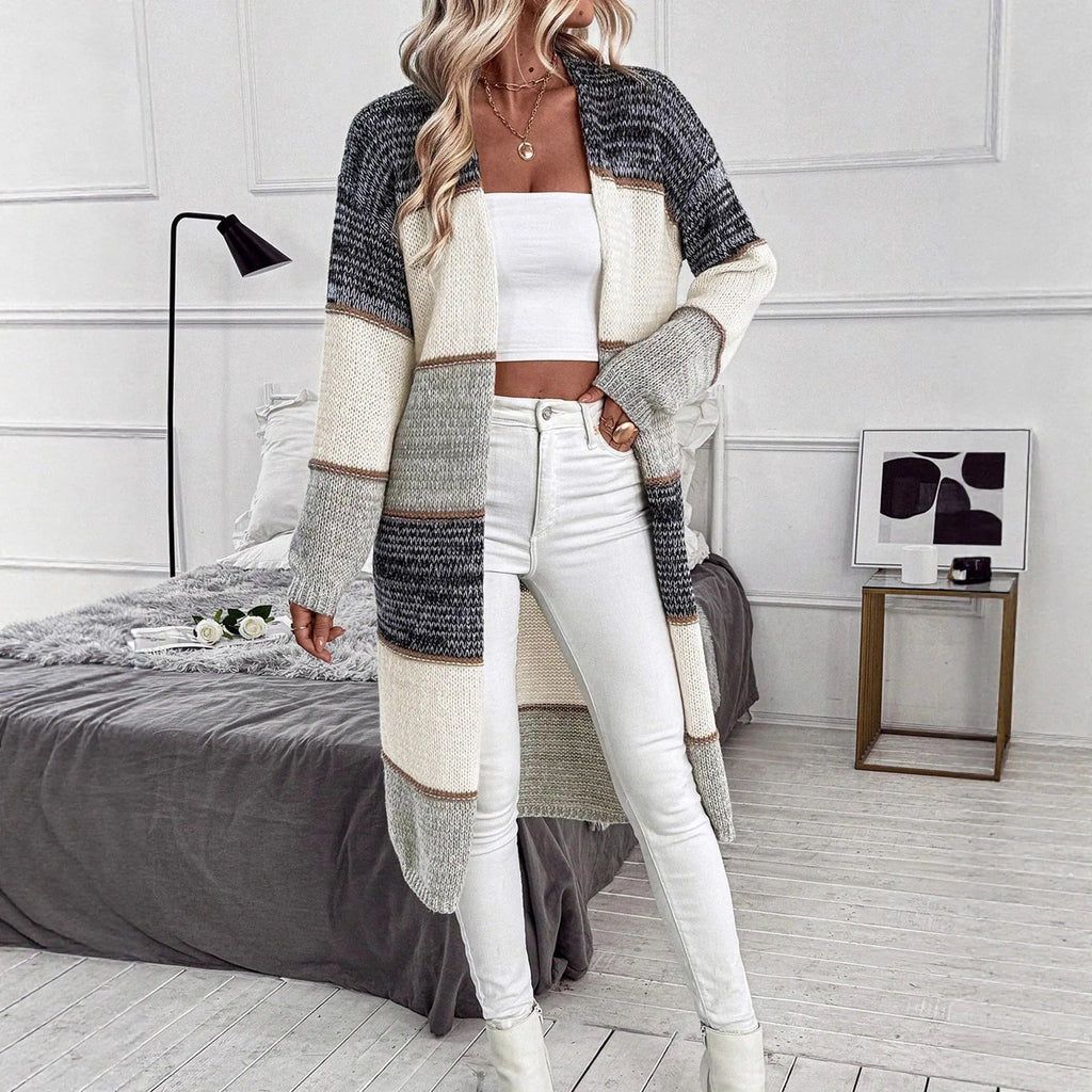 Grey striped women's knitted cardigan with loose fit and long sleeves