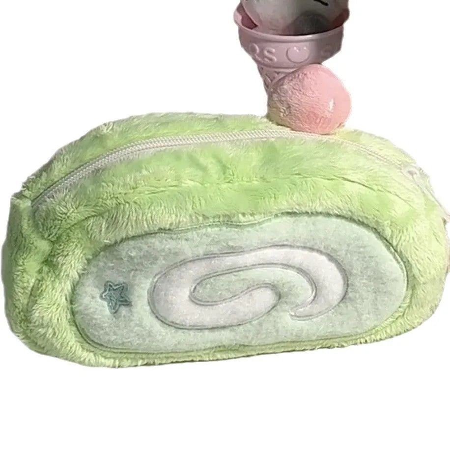 Honeydew roll plush velvet pencil case with Swiss roll cake design in beige, brown, and cream colours