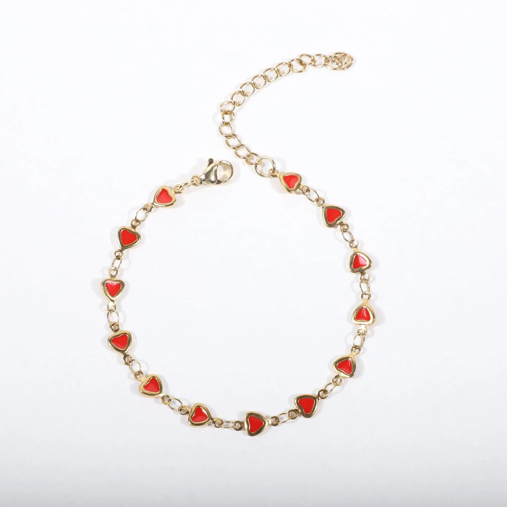 Heart-shaped stainless steel bracelet with gold plating on an adjustable 17+5cm band.