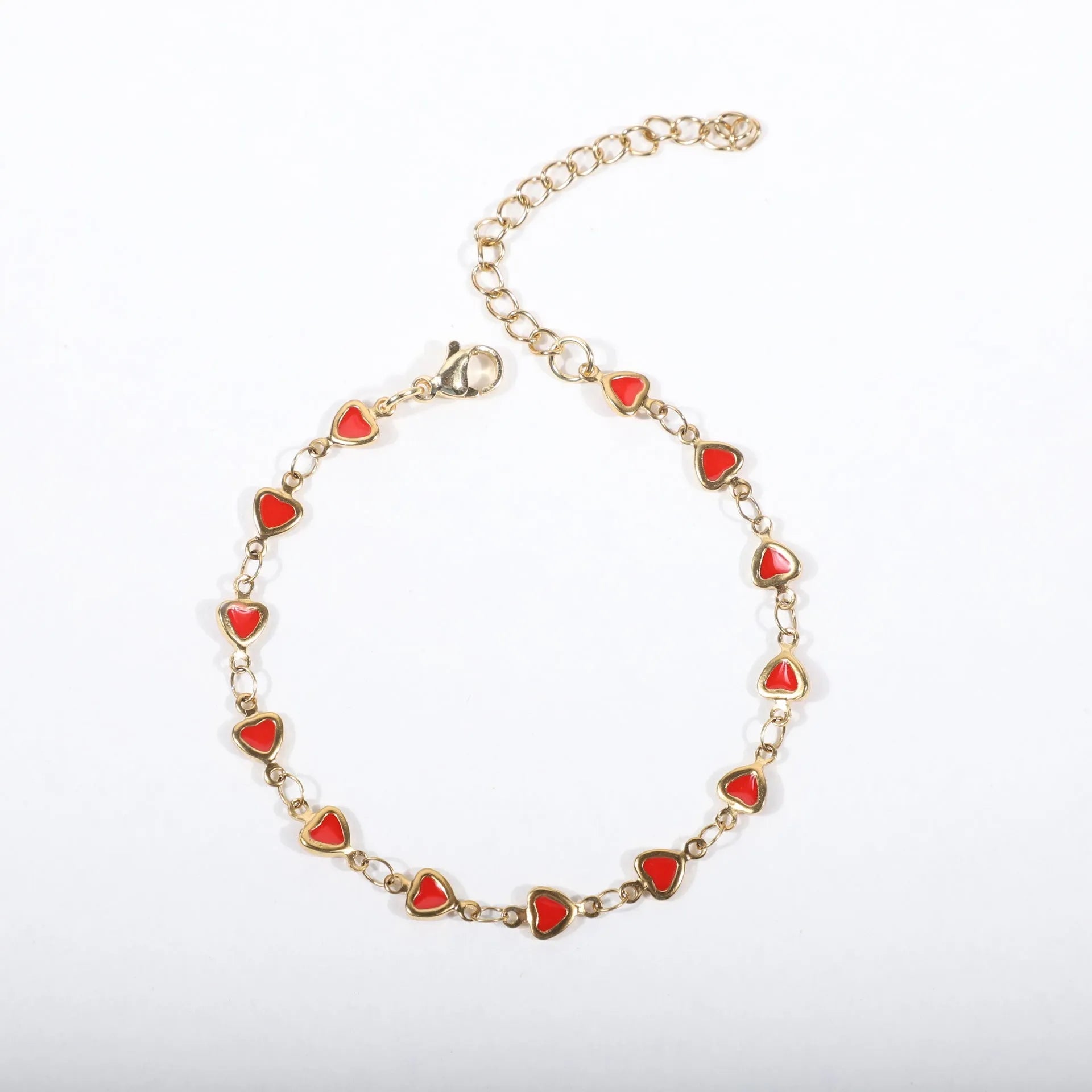 Heart-shaped stainless steel bracelet with gold plating on an adjustable 17+5cm band.