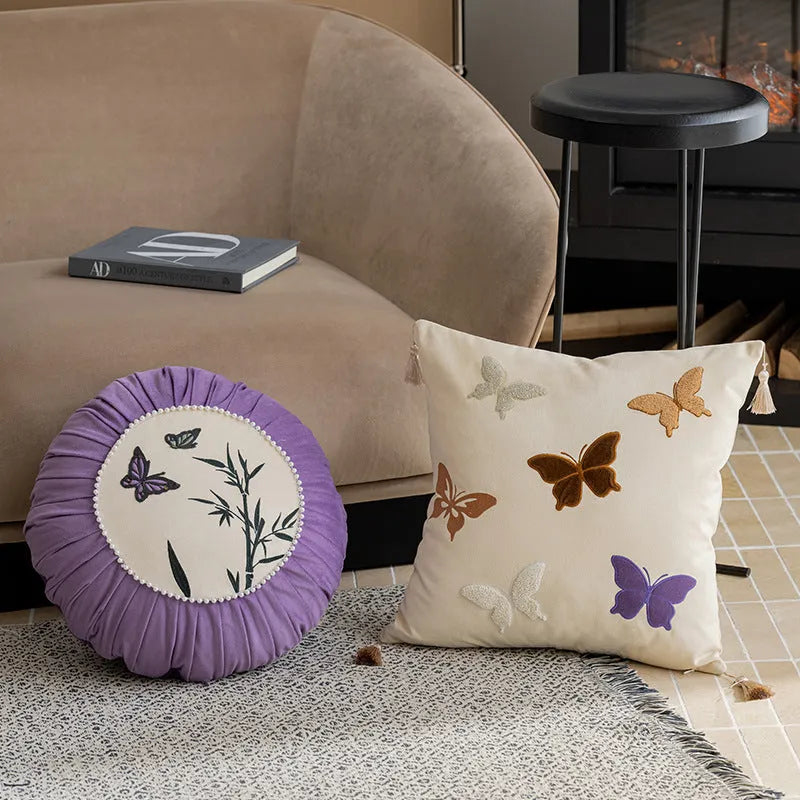 Square cushion with Chinese style butterfly embroidery in beige, black, and purple colours