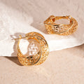 Geometric hollow stud earrings with twisted round design in silver or gold finish