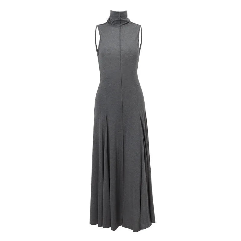 Grey cotton women's backless dress with half turtleneck and high-waisted slim fit