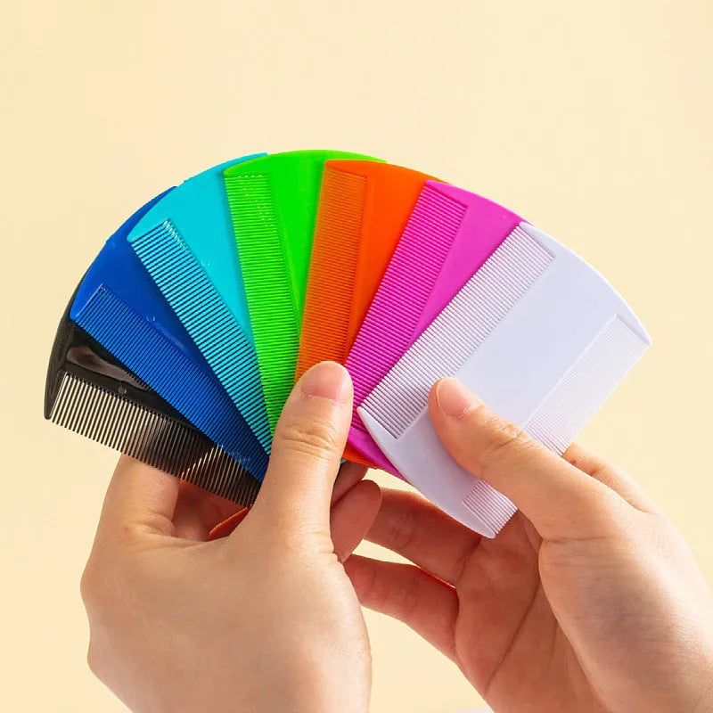 Fine teeth double-edged plastic flea and lice comb in multiple colours measuring 8cm
