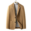 Men's slim fit wool suit jacket in grey on a hanger, showing notch lapel and button front.