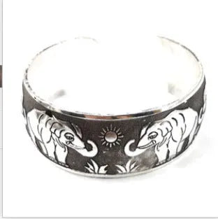 Ethnic carved open Miao silver Roman bracelet in alloy with elephant colour option