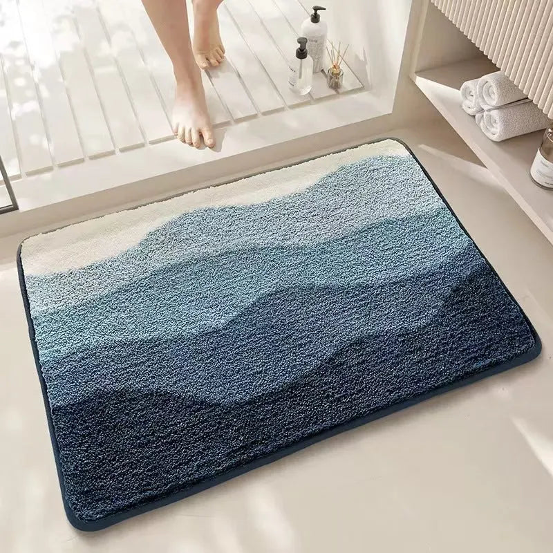 Square rainbow pattern floor mat with blue and colourful design on polyester with plastic bottom