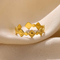 Geometric titanium steel women's ring with gold diamond detail on adjustable band