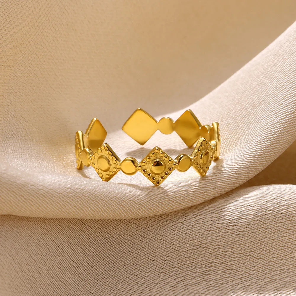 Geometric titanium steel women's ring with gold diamond detail on adjustable band
