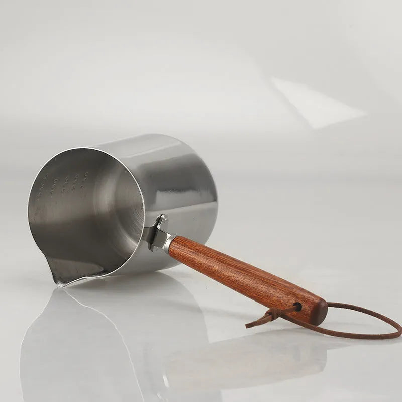 Stainless steel coffee cup with wooden handle and garland pattern design