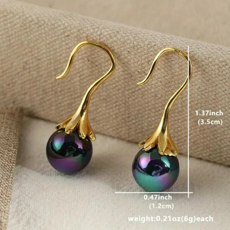 Gold electroplated retro fashion women's earrings with alloy construction