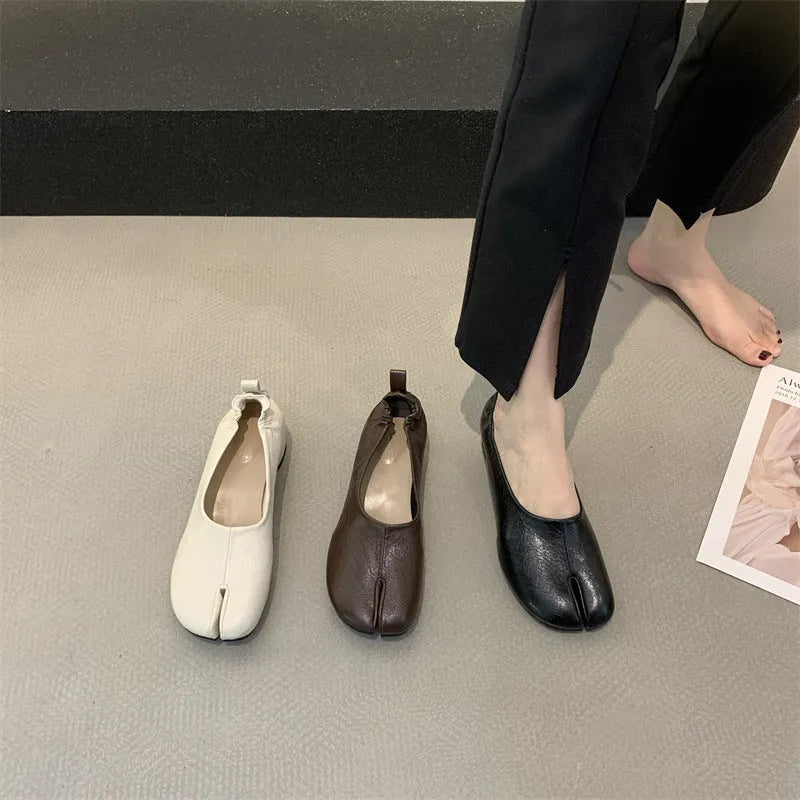 Women's round toe chunky heel pumps in apricot with a split toe horseshoe design and low heel.