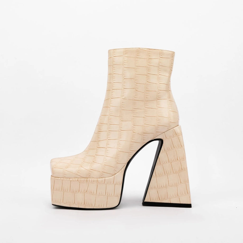 Women's brown ankle boot with a high heel above 8cm and an artificial PU upper