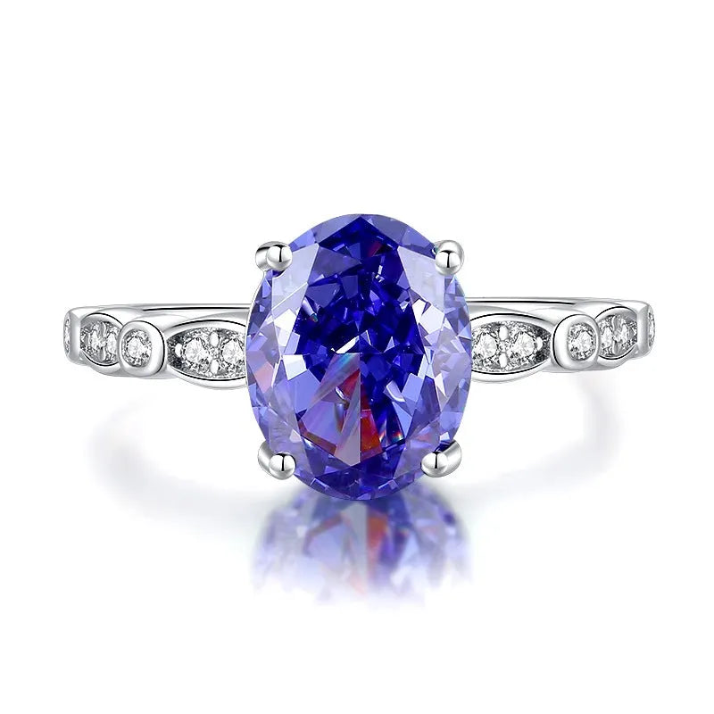 Heart-shaped high carbon diamond-cut ice flower zircon stone in a women's 925 sterling silver ring.