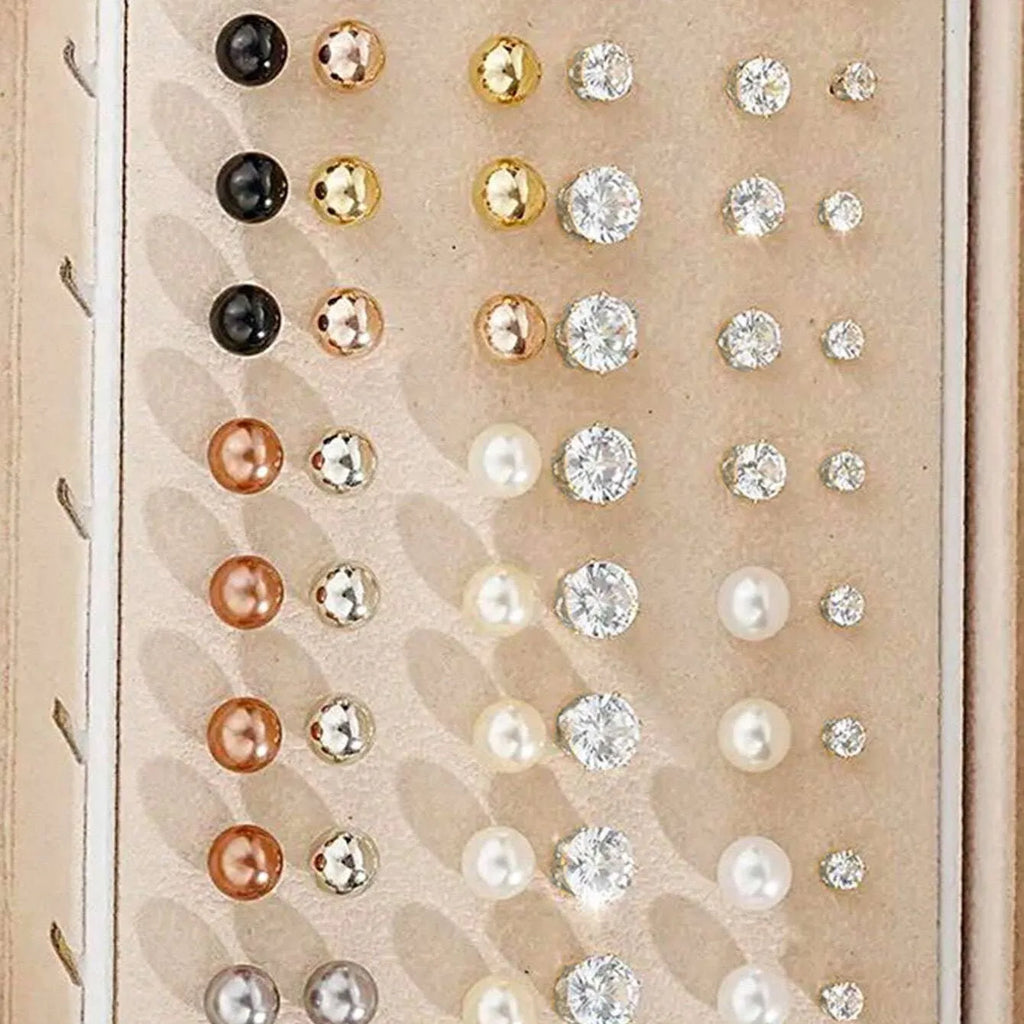 108 geometric pearl earrings in gold and yellow colours with round elements on alloy studs