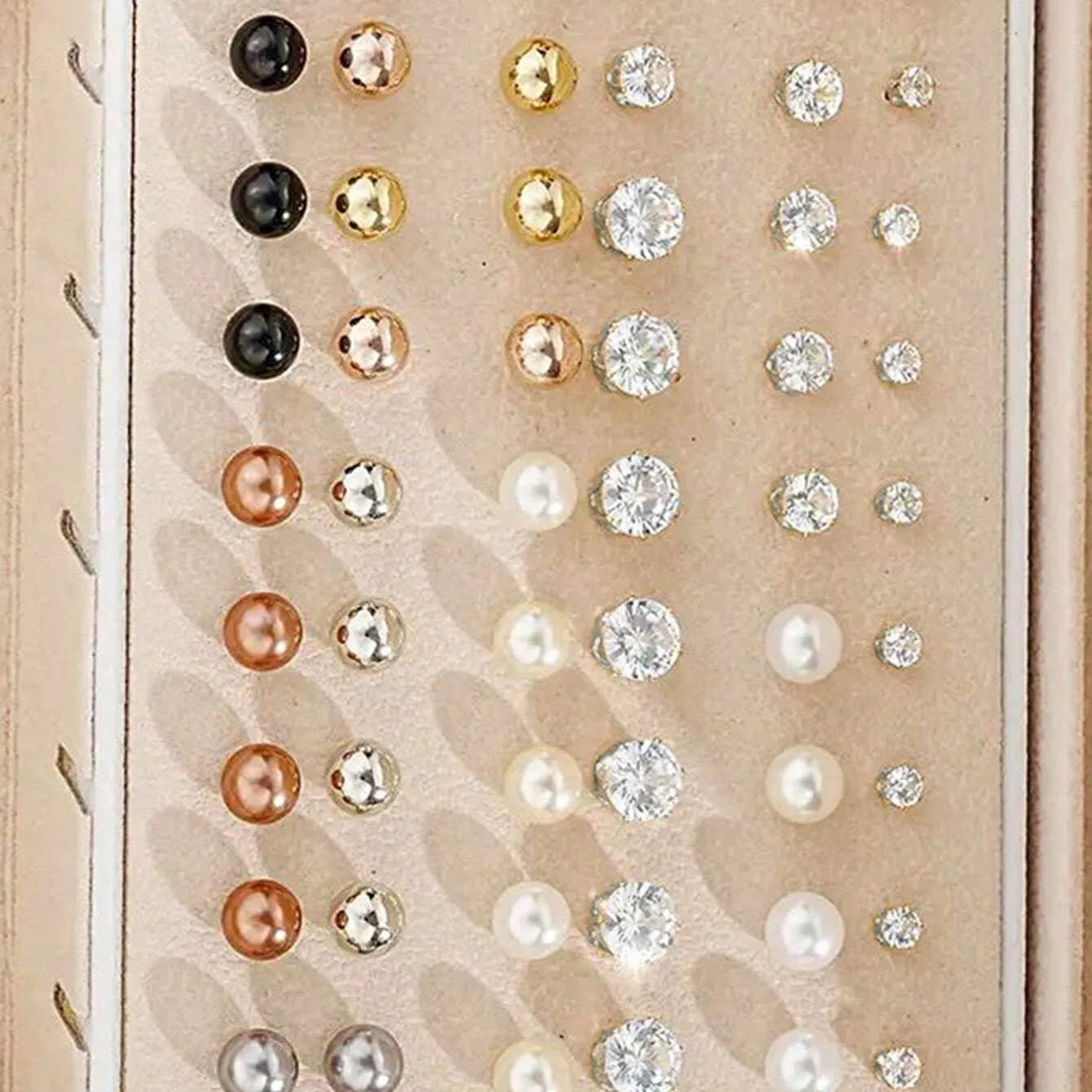 108 geometric pearl earrings in gold and yellow colours with round elements on alloy studs