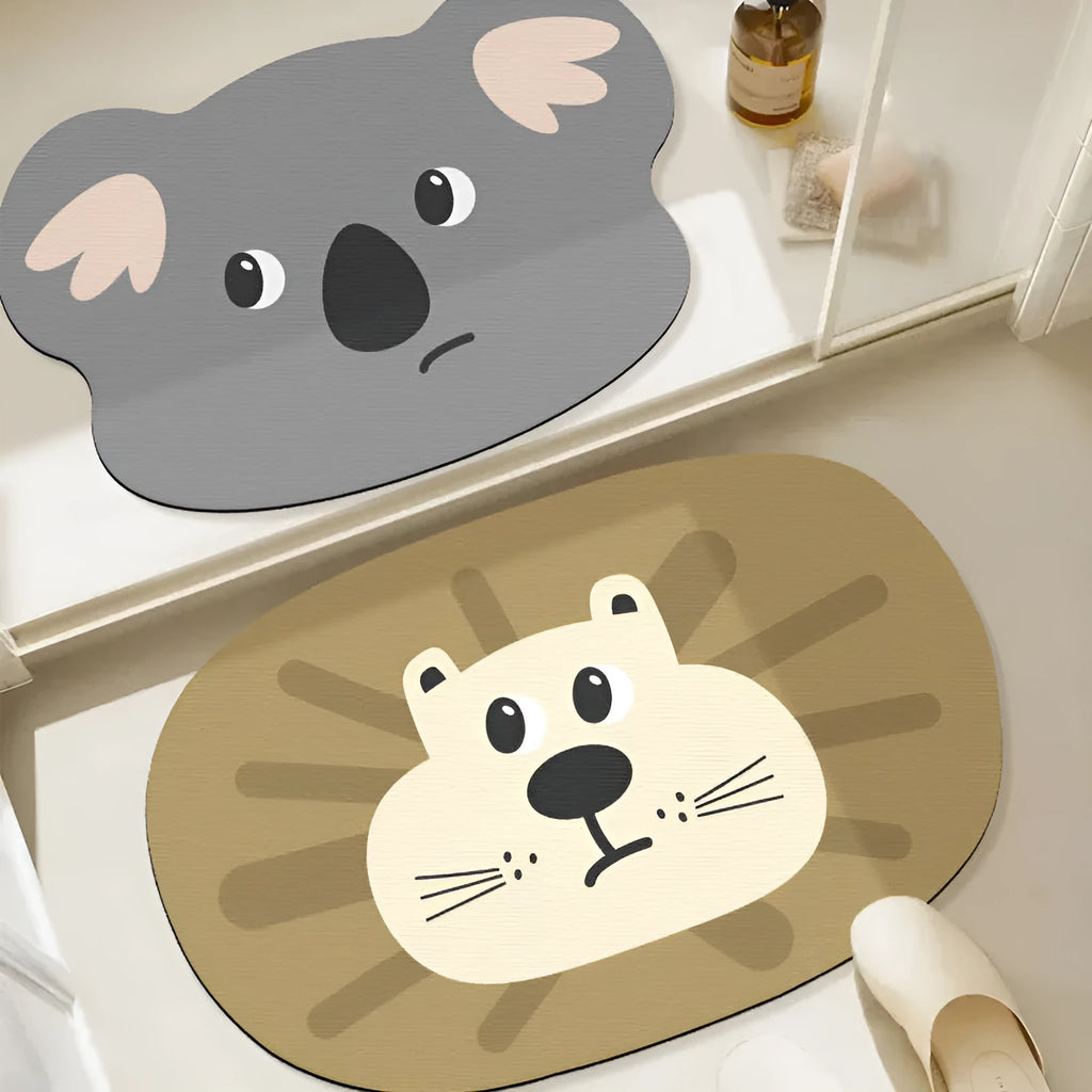 Colourful cartoon animal diatomite absorbent bathroom mat in alien shape on tiled floor.