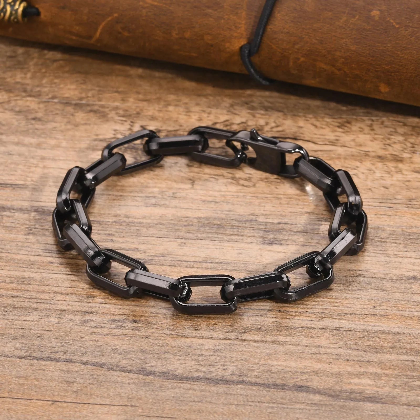 Men's simple square chain titanium steel bracelet in gold finish with clasp.