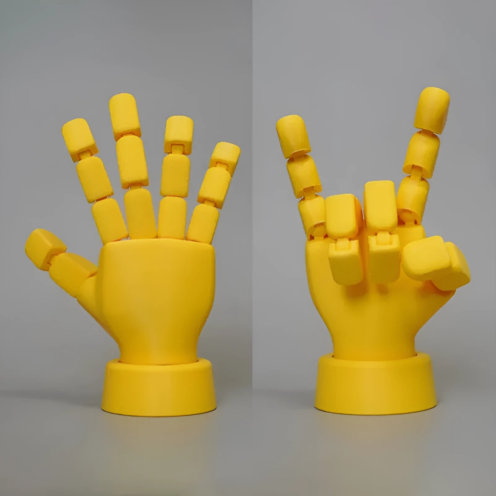 Yellow PLA plastic hand ornament with movable finger joints measuring 5 x 5.38 x 7.5 cm