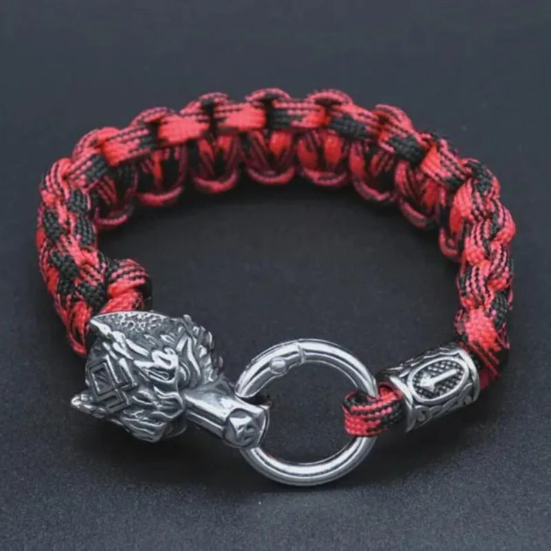 Handmade titanium steel wolf head bracelet with camouflage colour finish showing polished surface detail