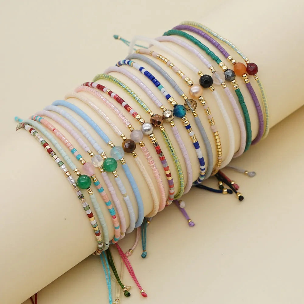 Handmade colourful Bohemian bracelet with geometric glass and coloured glaze beads in various colour options