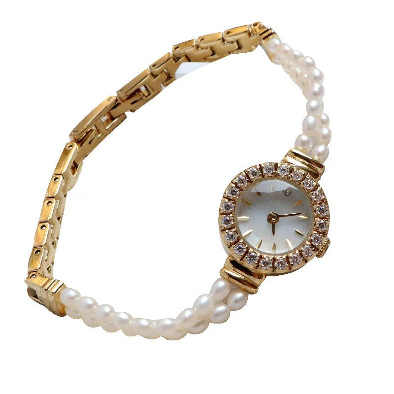 Women's light gold bracelet watch with freshwater pearls, 18mm round dial, single folding buckle
