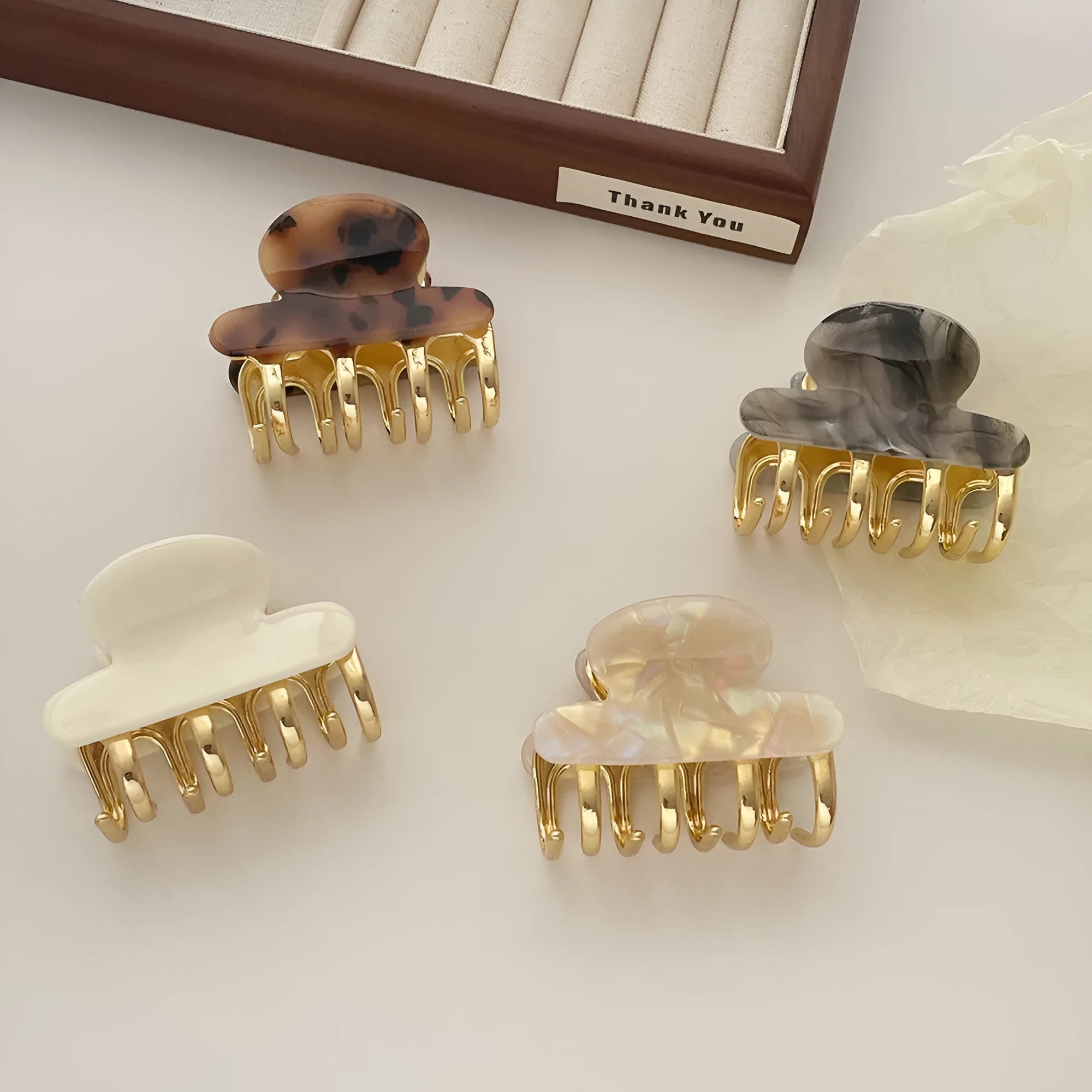 Retro acetate hair barrettes with metal grip in four colour variations including leopard print