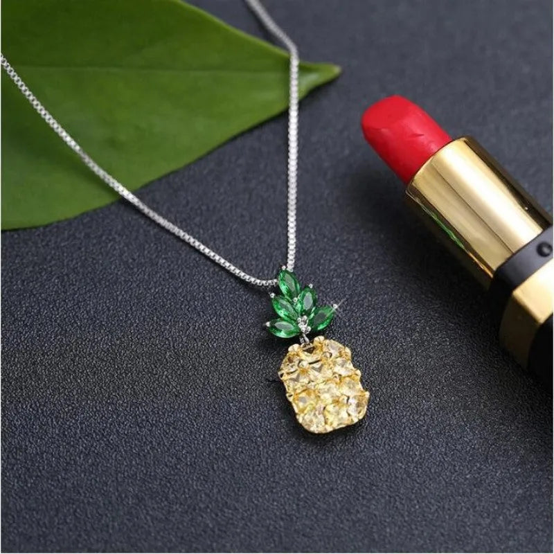 Geometric pineapple diamond pendant necklace on silver plated chain with copper white gold finish