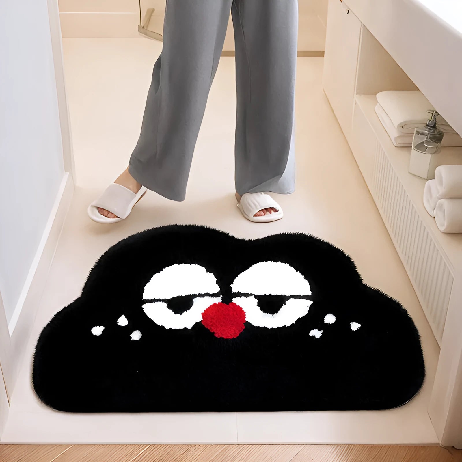 Cartoon big eye clouds patterned bathroom mat in imitation cashmere polyester, shown in bubur little green colour.