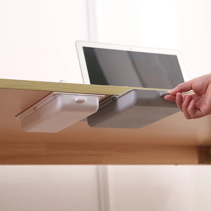 Small plastic under-table storage box with covered grid design in solid colour options for desk organization