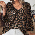 Women's multicolour leopard print polyester pullover top with V-neck and half sleeves on a hanger