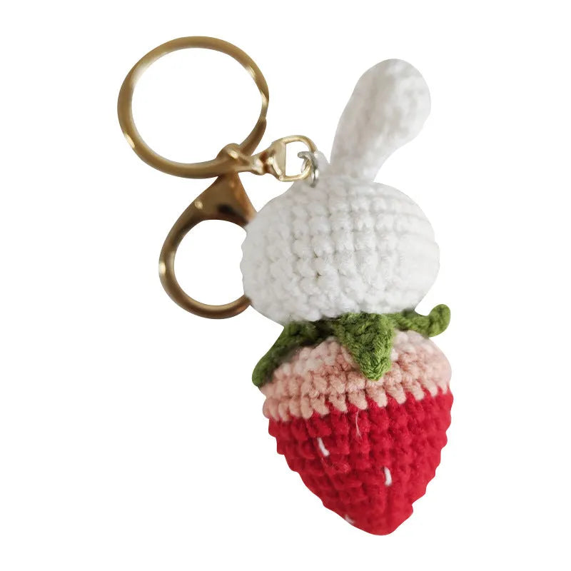 Hand-woven rabbit pendant with strawberry pattern made from four-strand wire with key attachment