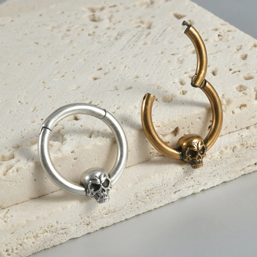 Copper punk earrings with ghost head design in antique silver and gold finishes