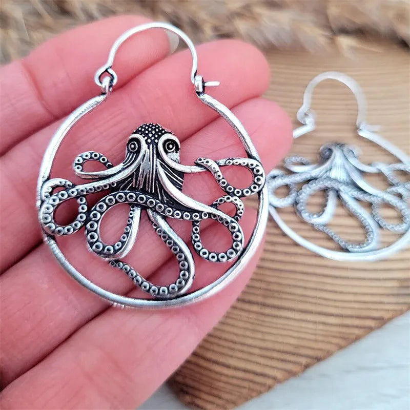 Vintage antique silver octopus earrings with detailed tentacles, retro animal zodiac design.