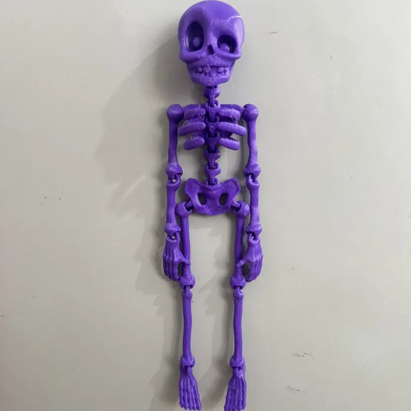 3D printed skull refrigerator magnet in multiple colours measuring 18cm high