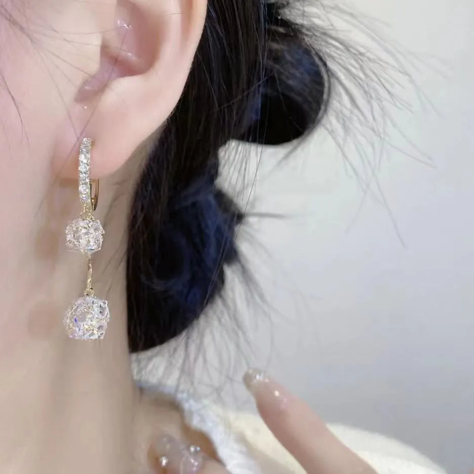 Silver confession balloon earrings with double pendant design and rhinestone ball decoration
